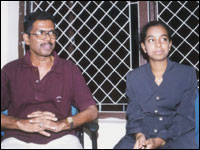 Raghavi,  with her coach D Ganesh