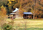 A log cabin bed and breakfast awaits you on a Tennessee Walking Horse Farm.