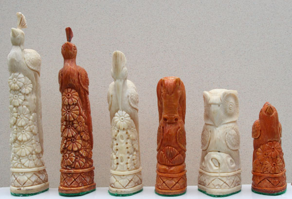 The Birds Chess set hand-carved in Camel bone. Look at the amazing detail as every chess piece is unique!