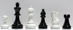 The Minstral Black/White Lacquered Chessmen.