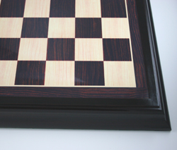 The raised plinth wooden and synthetic rosewood chess board