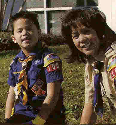 Cub Scout and leader