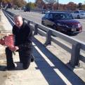Robert Popp laying flowers on the bridge between Little Ferry and Ridgefield Park, where his sister was run down in 1969.