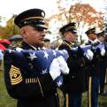 U.S. Army officers hold the American flags that will be presented to the families of the Army recruits who died on November 8, 1961, on their way to basic training in South Carolina. The soldiers were finally honored with a monument in Third Ward Park on Wednesday, Nov. 9, 2016.